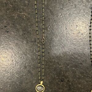 Elegant Gold and Black Pendant Necklace